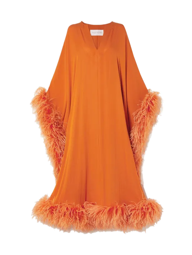 Oranje kaftan van Valentino.