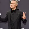 Robbie Williams verloor miljoenen door overlijden koningin Elizabeth II | Beau Monde