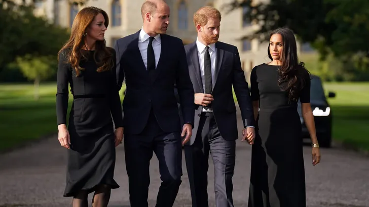 The Prince and Princess of Wales and the Duke and Duchess of Sussex viewing the messages and floral tributes