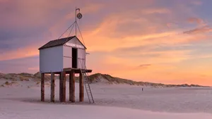 Refuge hut on Terschelling island in The Netherlands at sunset