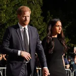 The Prince and Princess of Wales and the Duke and Duchess of Sussex viewing the messages and floral tributes