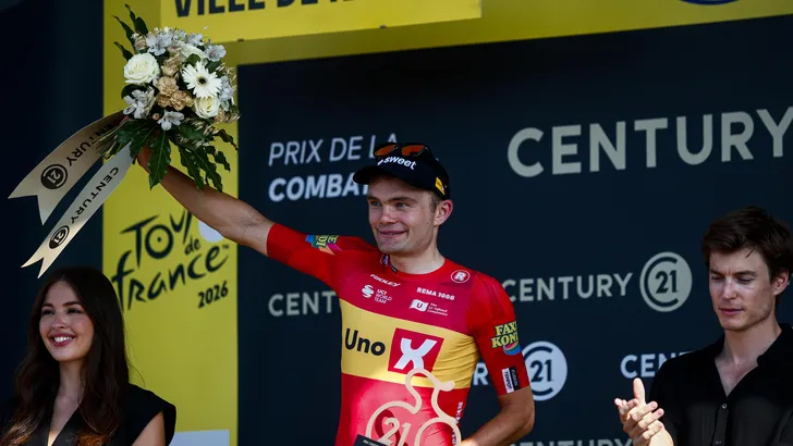 Waerenskjold als winnaar van de etappe op het podium.