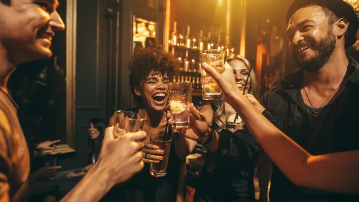 Young men and women enjoying a party