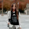 Cozy herfsttrend: zo draag je de dad vest 