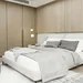 Slaapkamer met groot bed - beddengoed