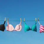 Four colorful Bras on Clothesline