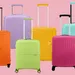 10x de leukste gekleurde handbagage koffers voor deze zomer
