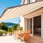 Summer terrace under a canopy of a modern house.