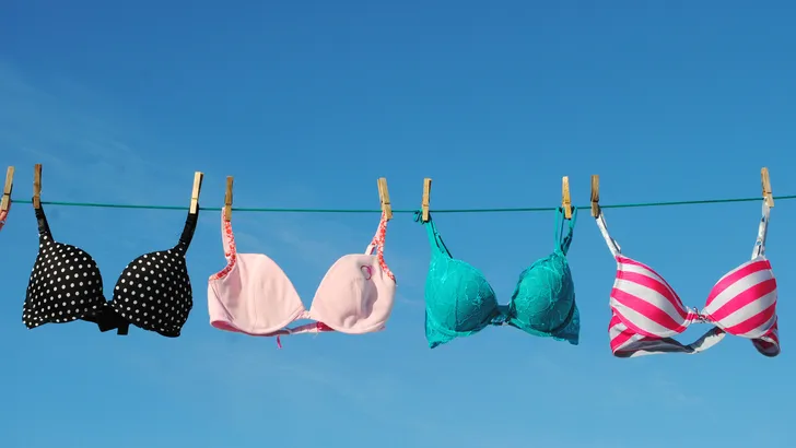 Four colorful Bras on Clothesline