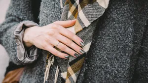 Close-up of a married woman in a coat