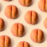 Fresh Peach on Peach Colored Background