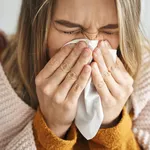 Woman having a very heavy flu