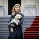 Queen Maxima of The Netherlands with her dog Mambo 