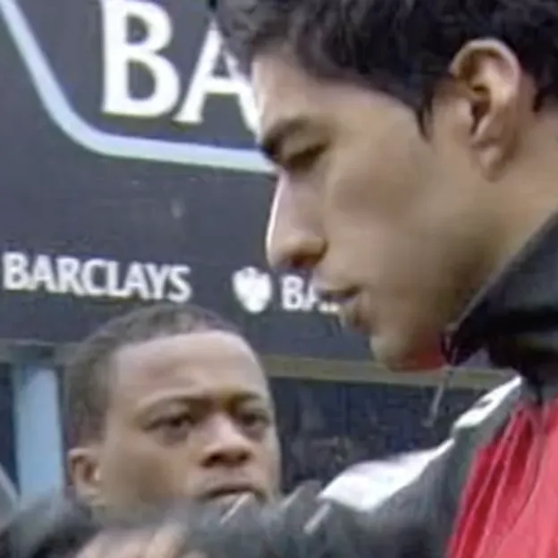 Patrice Evra en Luis Suárez