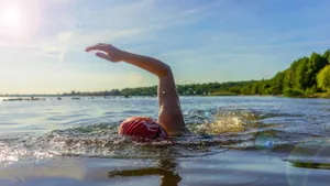 Woman swimming in a lake