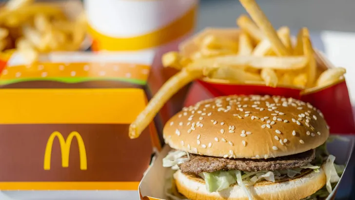 tray full of fast food in McDonalds Restaurant, Big Mac Menu with McDonalds logo box, Cheeseburger, French fries, Cola, 23.03.20 Kemer Turkey