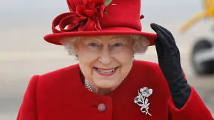 Britain's Queen Elizabeth II arrives at a windy RAF Valley in Anglesey, to visit her grandson Prince William at the base.