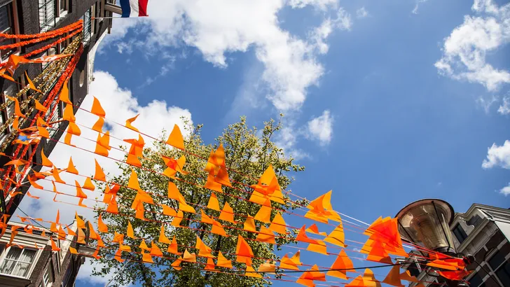 The Netherlands flag and decorations on King's day in Amsterdam