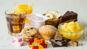 Selection of food high in sugar, copy space