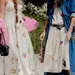 Vrouwen in lange, luchtige jurken tijdens Fashion Week.