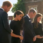 The Prince and Princess of Wales and the Duke and Duchess of Sussex viewing the messages and floral tributes