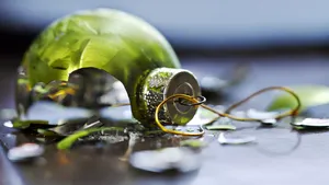 Green, broken glass Christmas ornament 