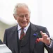 Koning Charles zwaait