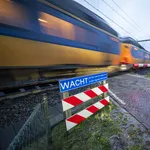 Een spoorwegovergang. ProRail heeft flitspalen geplaatst bij een flink aantal van dit soort punten, waardoor veel boetes zijn uitgedeeld.