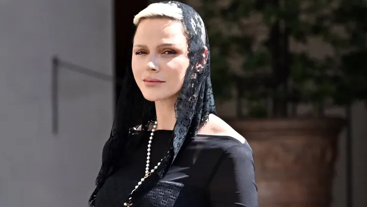 Prince Albert II and Princess Charlene of Monaco after the meeting with the Pope