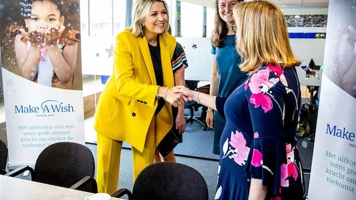 Máxima in zonnig geel bij Make-A-Wish