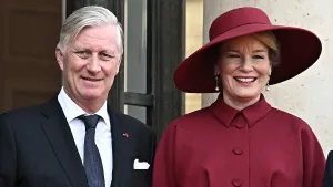 Kerstkaart Belgische koninklijke familie – Foto van koning Filip en koningin Mathilde bij het staatsbezoek aan Frankrijk.