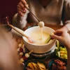 Spice up je kaasfondue: met deze 5 upgrades til je de kaasfondue naar een sterrenniveau | Nouveau