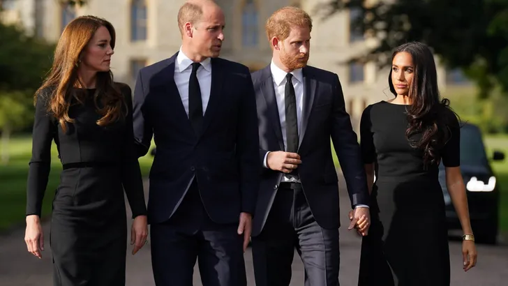 The Prince and Princess of Wales and the Duke and Duchess of Sussex viewing the messages and floral tributes