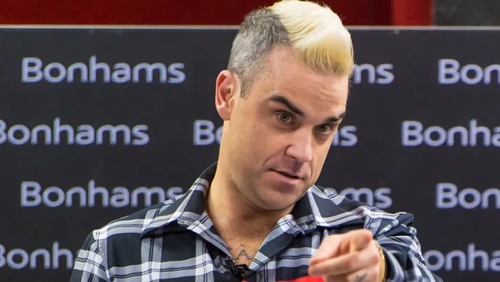 Robbie Williams flirt met 15-jarige