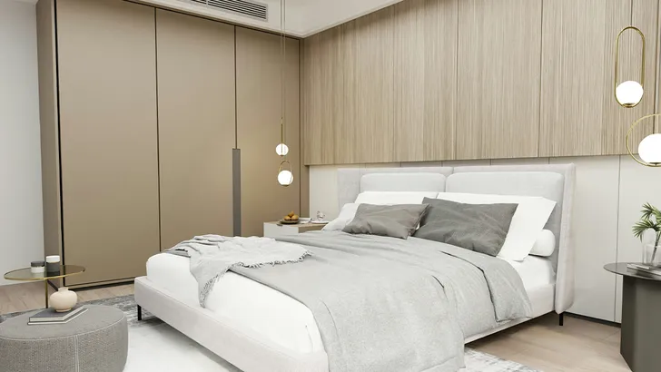 Slaapkamer met groot bed - beddengoed