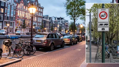 Nederlandse straat met inzetbeeld van cameracontrole bij een milieuzone