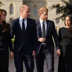 The Prince and Princess of Wales and the Duke and Duchess of Sussex viewing the messages and floral tributes