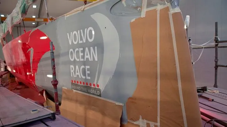 Team Dongfeng new Volvo Ocean 65 boat being painted at Green Marine
