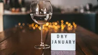 Challenge dry January. Wine glass with water. 