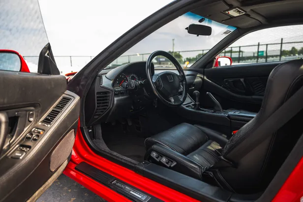 Zwart lederen interieur en bestuurdersstoel van Ayrton Senna's Honda NSX