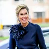 Geen zin in glitters? Met deze simpele truc van Máxima is je kerstoutfit in 1 seconde party-proof | Nouveau