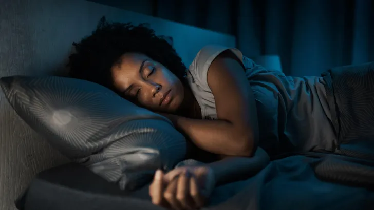 African american woman sleeping in her bed