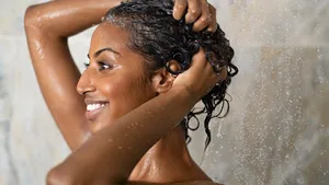 Woman bathing and washing hair