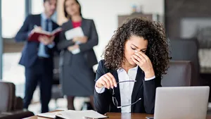 Portrait of burnout businesswoman in an office