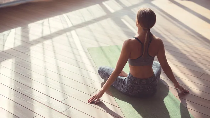 Young girl doing yoga