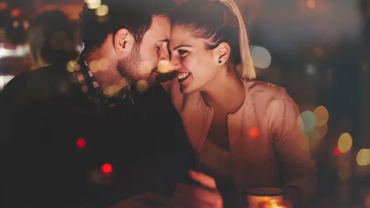 Romantic couple dating in pub