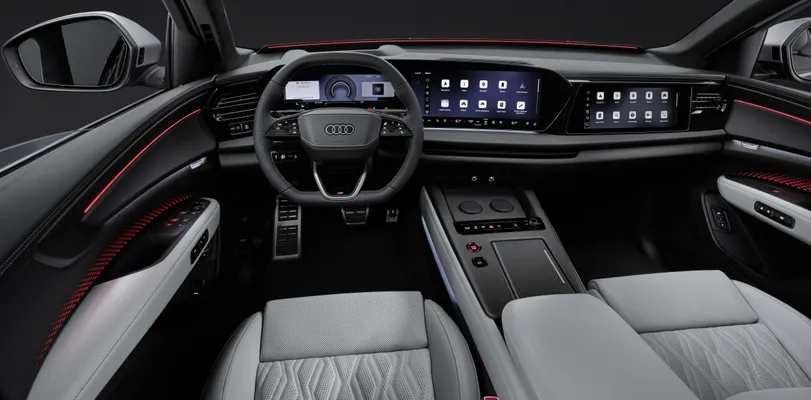 Het dashboard van de Audi Q9 bestaat uit drie digitale schermen, waaronder een afzonderlijk display voor de voorpassagier.