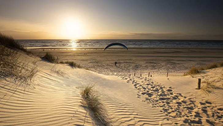 golden sunset over Dutch sea beach