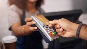 Credit card machine, cafe and hands of customer for b2c shopping, point of sale transaction and finance. Closeup, nfc and contactless payment in coffee shop at cashier, rfid technology and services