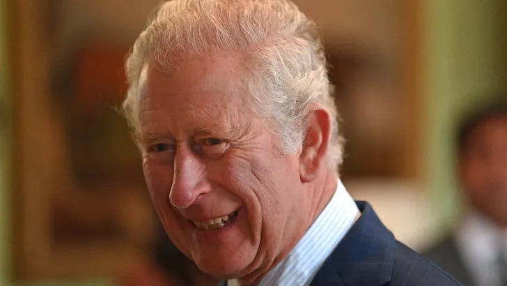 Britain's Prince Charles, Prince of Wales smiles as he meets Cambridge Trust students who are recipients of the HRH Prince of Wales Commonwealth Scholarships, during his visit to King's College in Cambridge, eastern England on March 31, 2022. (Photo by JU